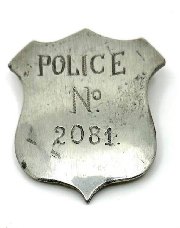 Handmade 1915-1924 steel police badge marked Potter Studio, valued at 0-0.