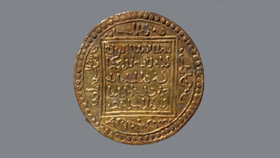 Gilded pseudo-coin, imitation Islamic coin from which the brooch was made. Photo: ALSH
