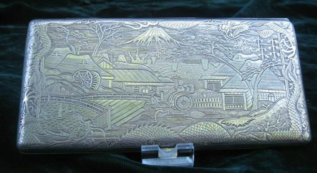 Teh Ling silver cigarette case that belonged to an American soldier