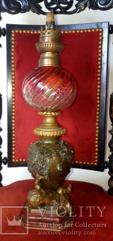 Kerosene lamp, work of Auguste Moreau, late 19th century, bronze.