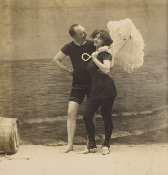 A couple in bathing suits pose on the beach, 1870s. Photographer Climax View Co.