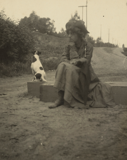 Woman with a dog, 1907-1943. Photographer Louis Fleckenstein