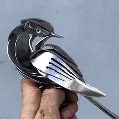 Recycling: birds made from old spoons and forks