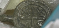 Как в этот клад попала монета с родовым знаком Рюриковичей?
