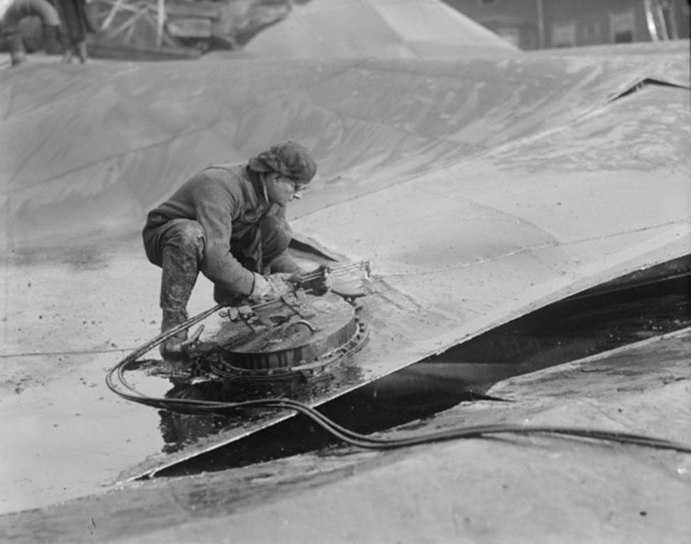 Tilted train and demolished bridge racks - consequences of an explosion at a Boston distillery