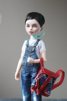 Artist and collector, animating dolls