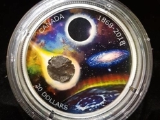 Космические деньги: в Канаде выпущены монеты с фрагментами метеорита