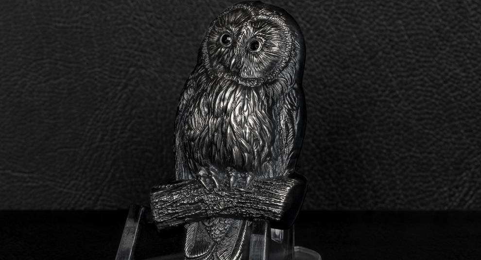 Mongolia issued a coin in the form of the Ural owl