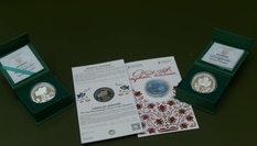 The National Bank presented two commemorative coins 