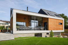 Архитекторы из Швейцарии создали двухуровневый дом для всей семьи (Фото)