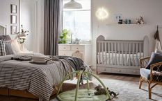 Interior designers talked about a crib in the parent's bedroom