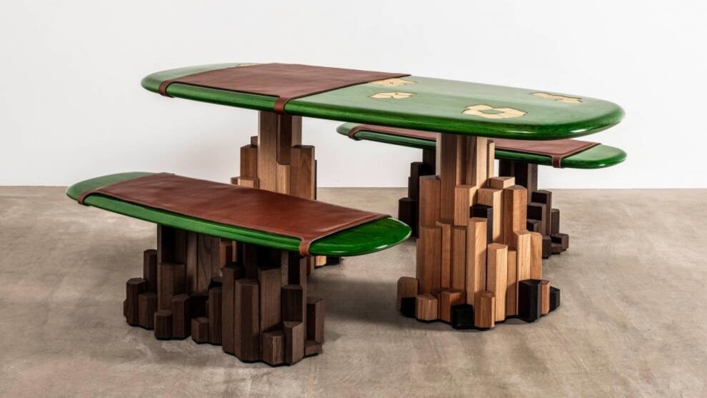 African American designer designed a table with a drainage system