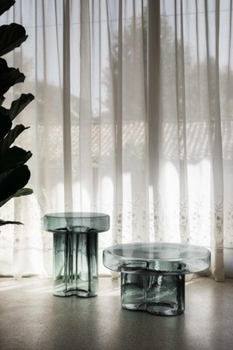 Greek designer presented a collection of monolithic glass tables