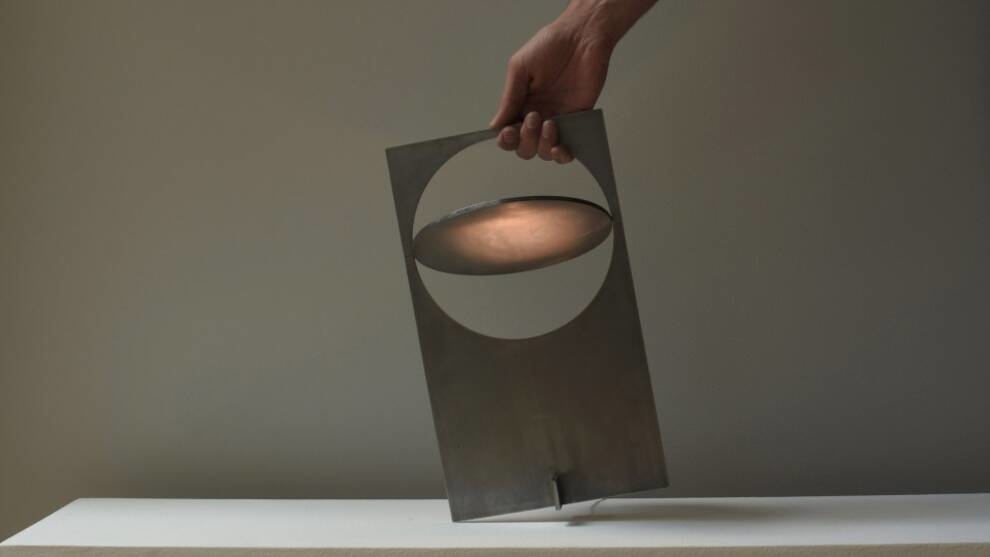 A Mexican designer assembled a lamp from a metal plate