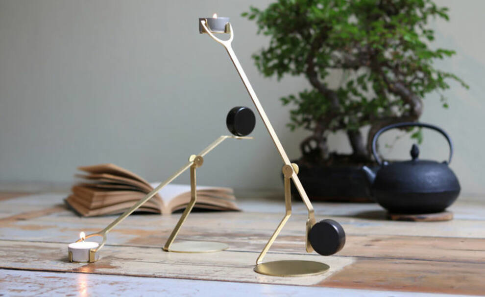 The Dutch designer candlestick works like a swing