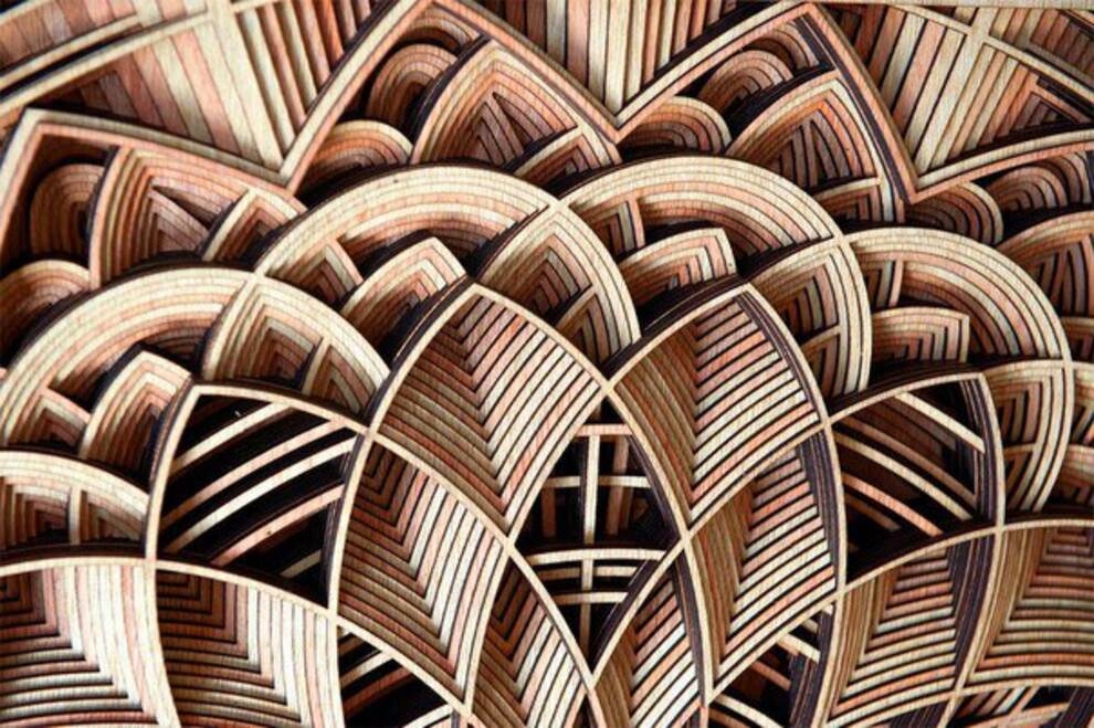 Abstract compositions and organic forms - carved patterns on plywood by a US joiner