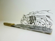 Художник з Пекіна створює ножі з підтекстом (Фото)