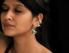 Delicate jewelry with a plot is created by a designer from India