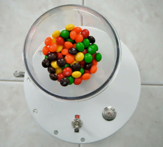 Disassemble by color: user created an automatic sorting machine for M & M's and Skittles