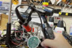 Development for people with hand tremors: engineer converted the tripod into a soldering iron
