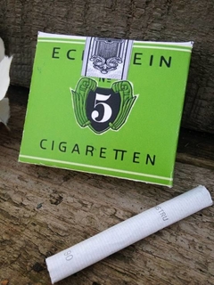 Сигареты пятерка. Сигареты вермахта Eckstein. Сигареты Eckstein № 5.. Немецкие сигареты Экштайн. Сигареты в камуфляжной пачке.