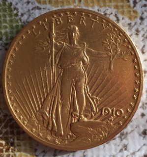 Золотая монета 20 долларов Сент-Годенса