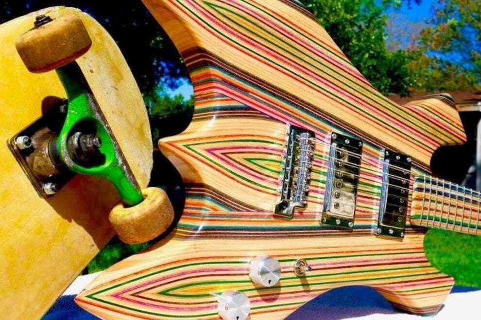 Playful music: a guitarist glued together an instrument from skateboards